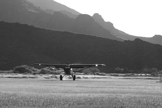 A Cub on short final into a mountain strip